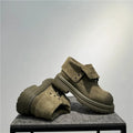 Retro distressed cow suede worker boots with thick soles in camel colour.