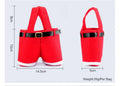 Red velvet drawstring Christmas bag measuring 21x14.5 cm on a plain background