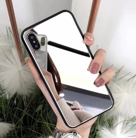 Black phone case for iPhone with a reflective mirror surface on the back.