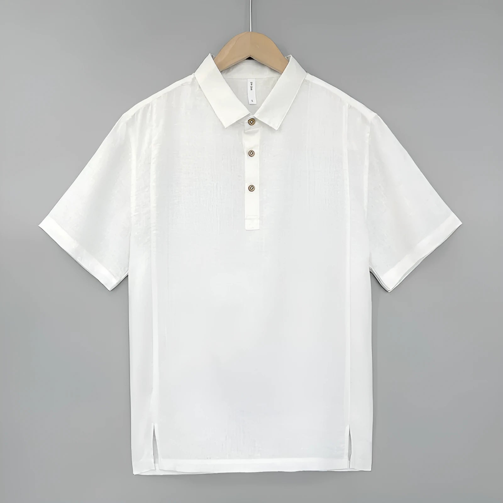 Men's loose grey green linen short sleeve top with thin lapels on a hanger