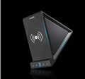 Black portable Bluetooth speaker with integrated mobile phone stand and wireless charging function.