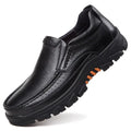 Men's black leather slip-on business casual shoes with a rubber sole