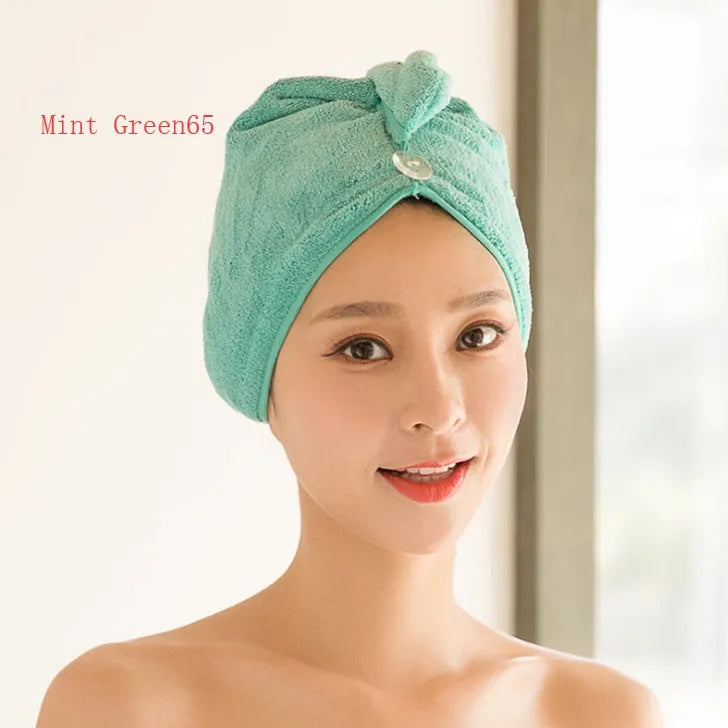 Microfiber hair drying cap in assorted colours measuring 60cm by 25cm