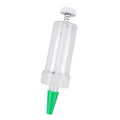 A white plastic mini seeder tool measuring 12cm long, used for planting seeds in pots and trays.