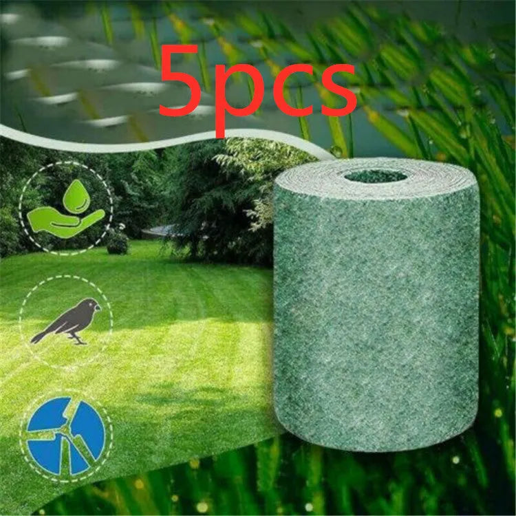 Biodegradable grass seed mat 20x300cm rolled out on bare soil showing wind proof and soil consolidation functions