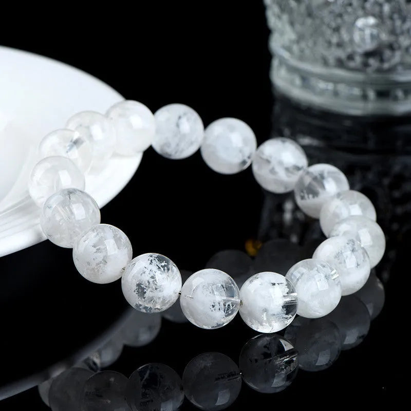 Women's crystal bracelet with natural blizzard snowflake round beads and traditional Chinese decorative elements