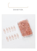 Rose gold heart-shaped paper clips with steel core construction, 28mm size