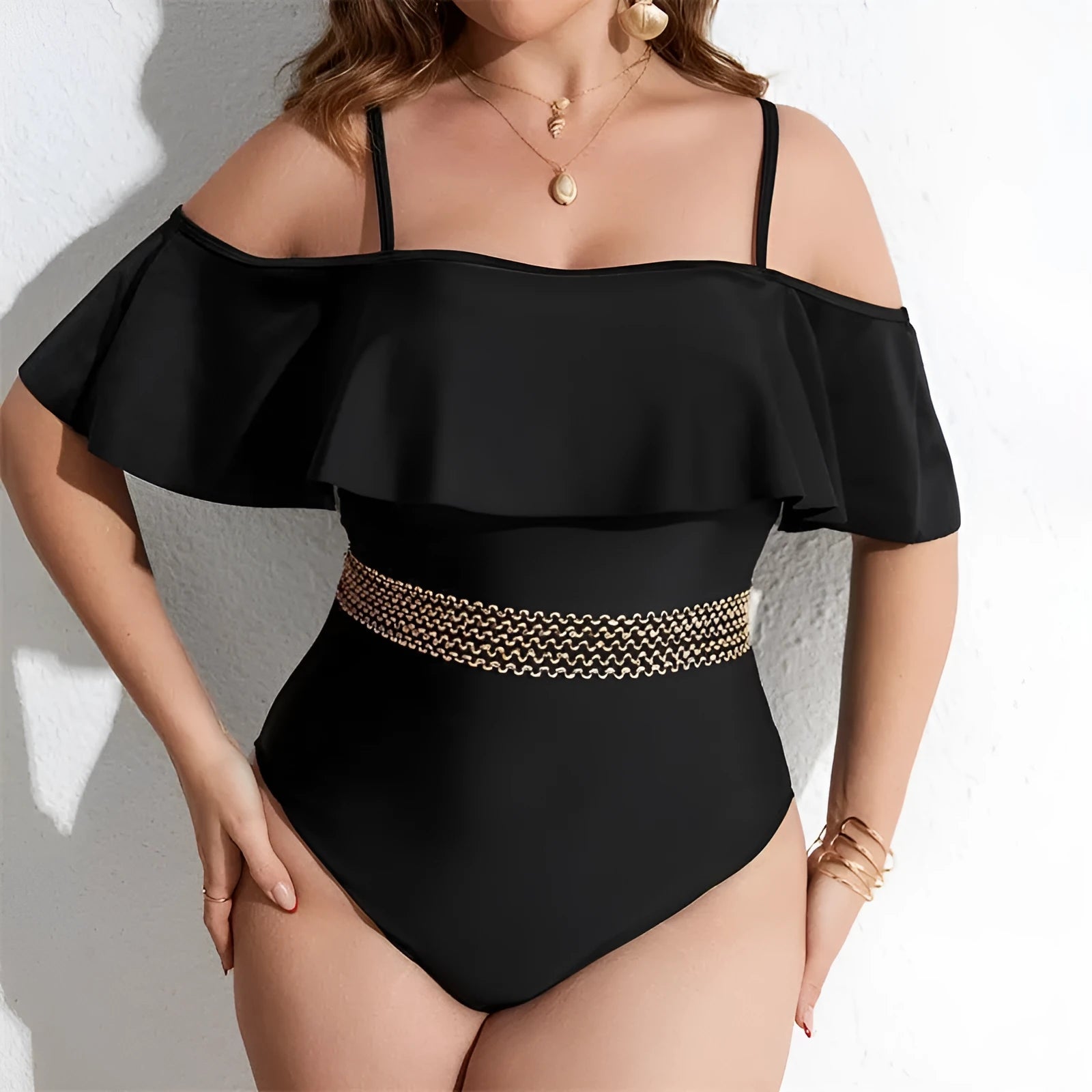 Black women's one-piece swimsuit shown in extended sizes