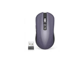 Black wireless gaming mouse with microphone grille, seven buttons, and a scroll wheel on a desk.