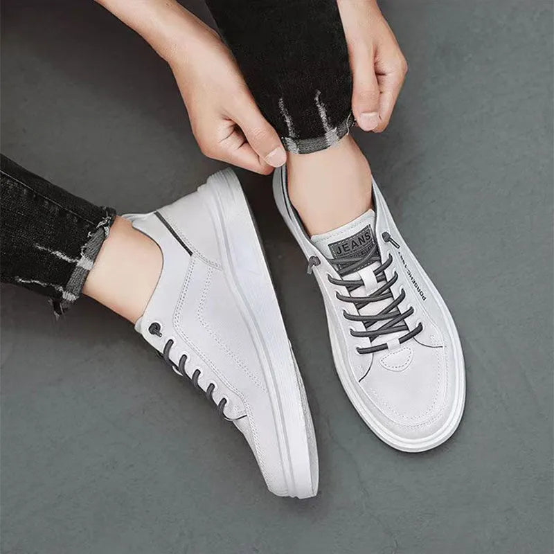 Men's grey canvas flats shoes with front lace-up stitching and shallow mouth design, side view