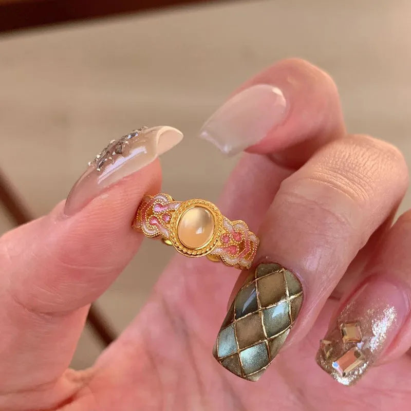 Geometric open band women's ring with pink crystal enamel on copper gold plating, colour K227.