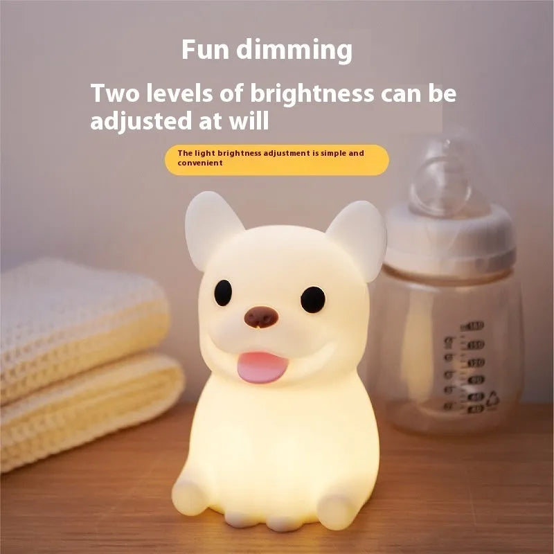 Silicone animal night light with USB charging port and touch dimming control in cartoon ox design