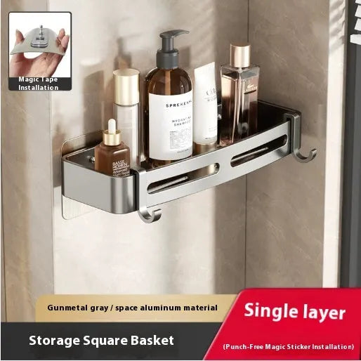 Gun grey triangle bathroom storage rack mounted in corner with towels and toiletries