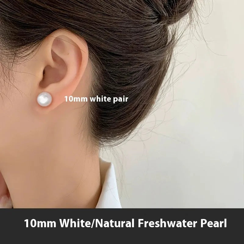 10mm white pearl drop earrings with S999 sterling silver findings, white colour, pair on display