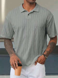 Retro button lapel short sleeve t-shirt in a cotton blend fabric, shown in a solid colour with a slit detail.