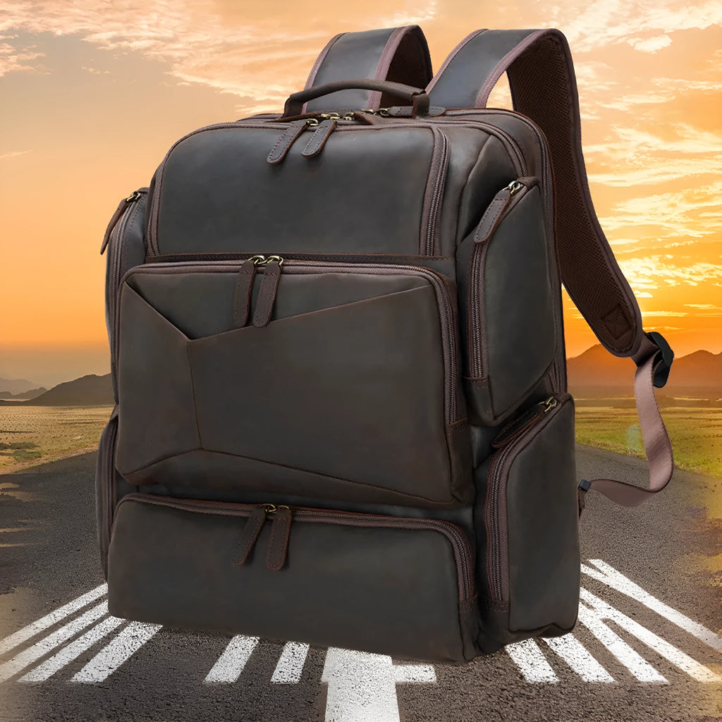 Dark brown retro leather backpack for a 17-inch laptop with double shoulder straps.