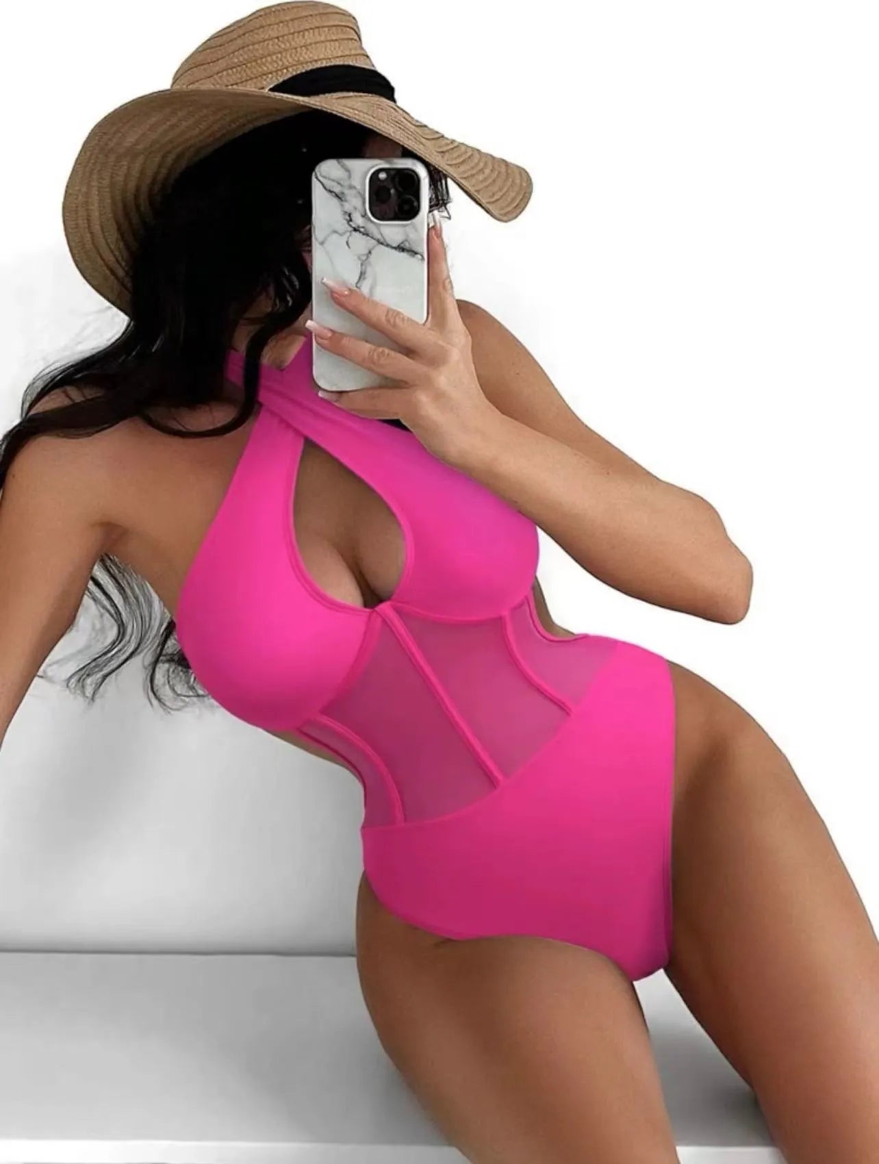 Women's black one-piece bikini swimsuit made from nylon and spandex fabric on a mannequin