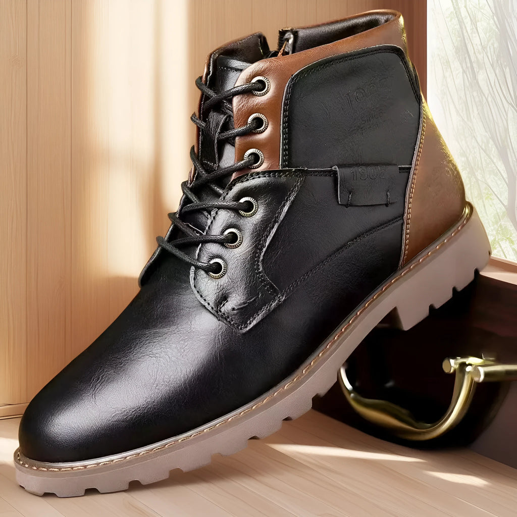 Men's brown leather-look ankle boots with a side zip fastening and rubber sole on a white background.