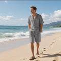 Linen blend short sleeve shirt and shorts beach suit in light blue.