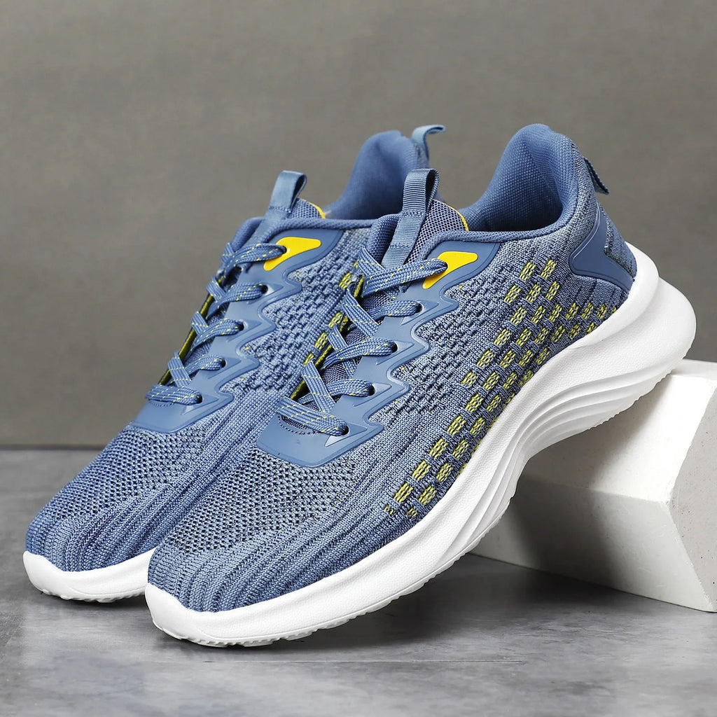 Women's lavender purple flyknit running shoes with mesh upper and striped pattern on a white background.