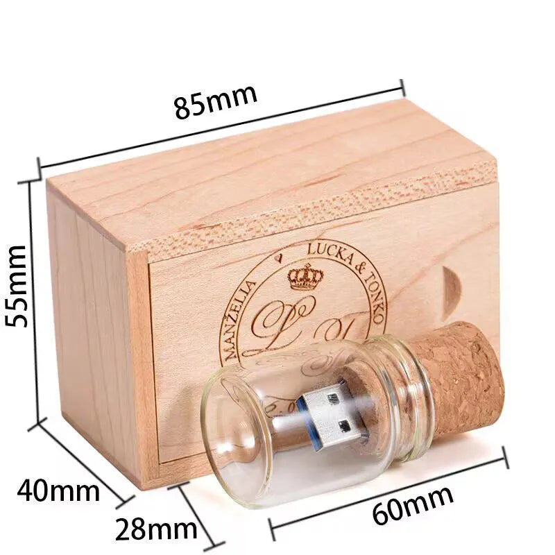 Wooden-lidded transparent glass bottle-shaped USB flash drive on a white background.