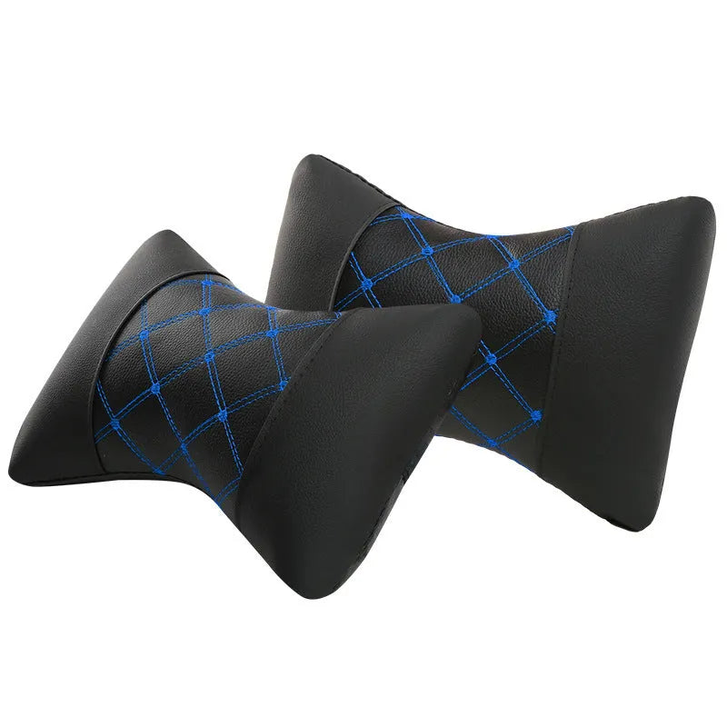 Black quilted artificial leather car headrest pillow with diamond stitching, shown on a car seat.