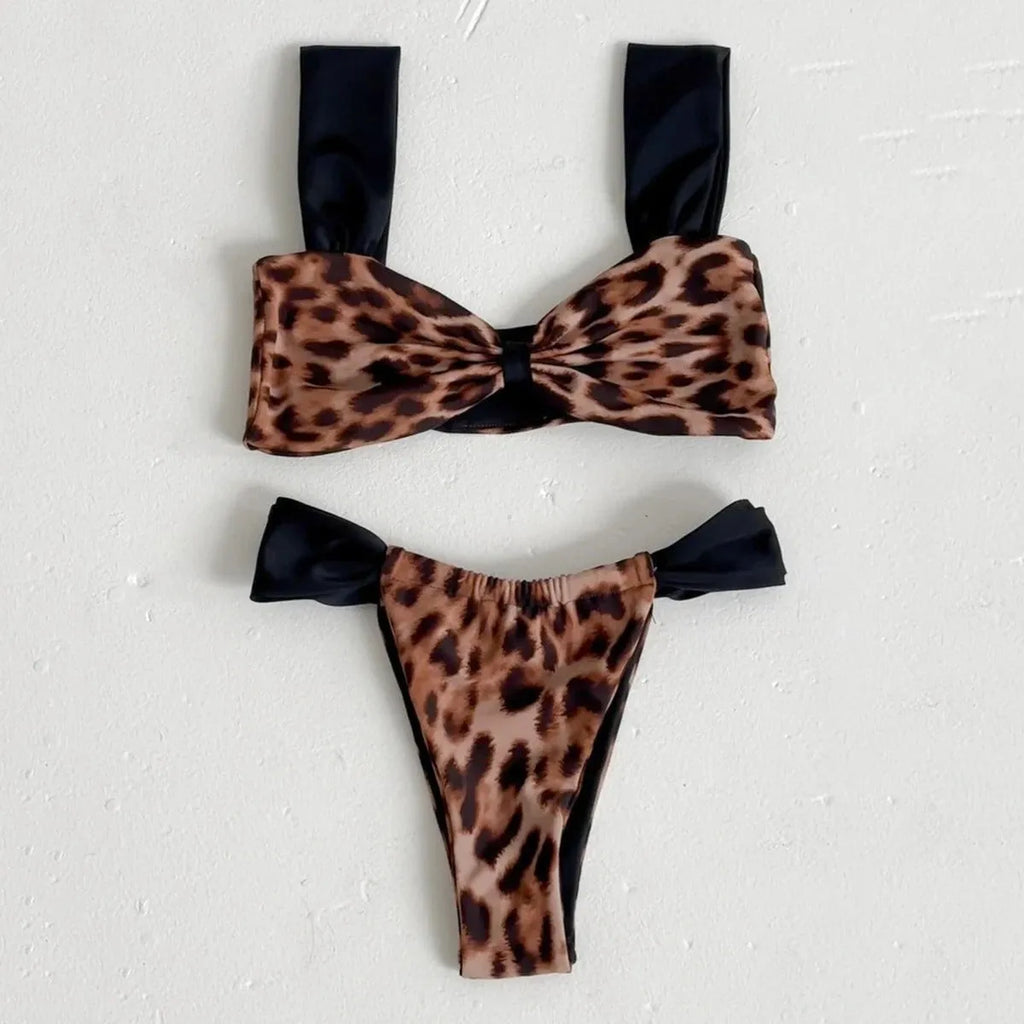 Women's leopard print bikini set with sleeveless tube top and matching swimsuit bottoms.