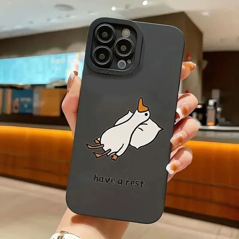Cute carved cartoon duck design on a black silicone case for an iPhone.