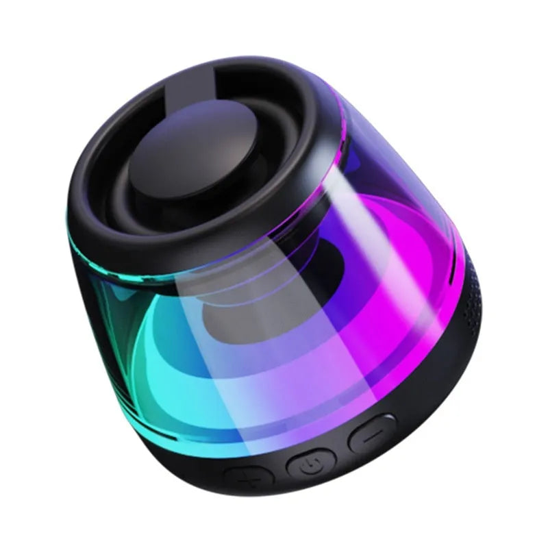 Portable white Bluetooth speaker with ambient lighting and magnetic base for desktop use