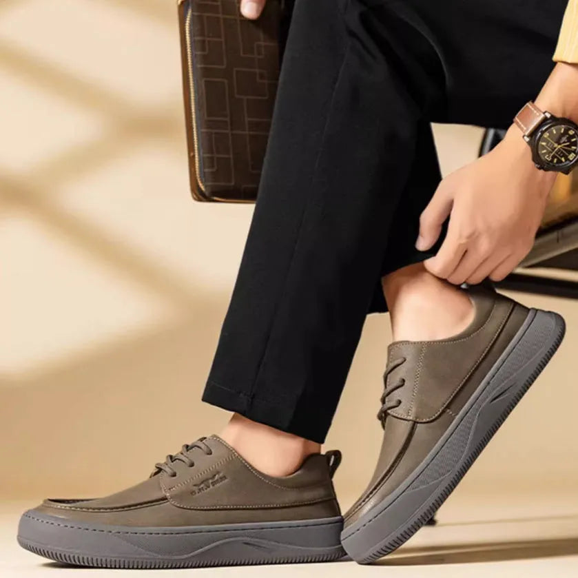Men's brown retro-style leather casual shoes with a big toe design and visible stitching.