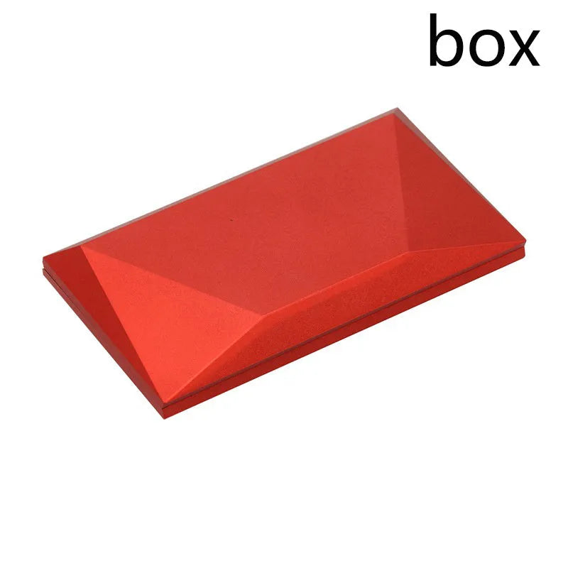 Red plastic heart-shaped rotating ring box with rose decoration inside white storage case