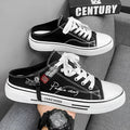 Men's canvas slip-on casual shoes in black or blue with round toe and PVC soles