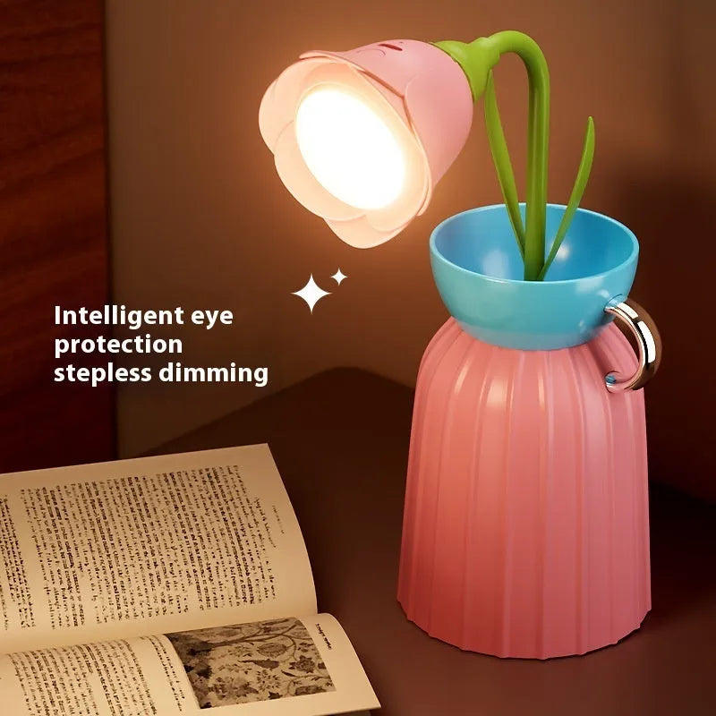 LED flower lamp in pink rose style with USB cable, 30cm tall, on a bedroom table
