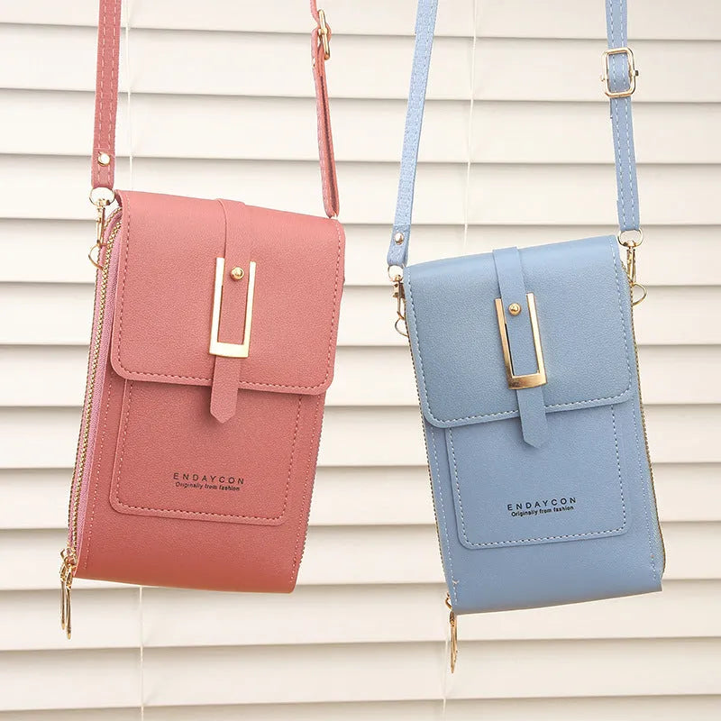 Women's transparent crossbody shoulder bag in PU material with touch screen phone capability, available in multiple colours