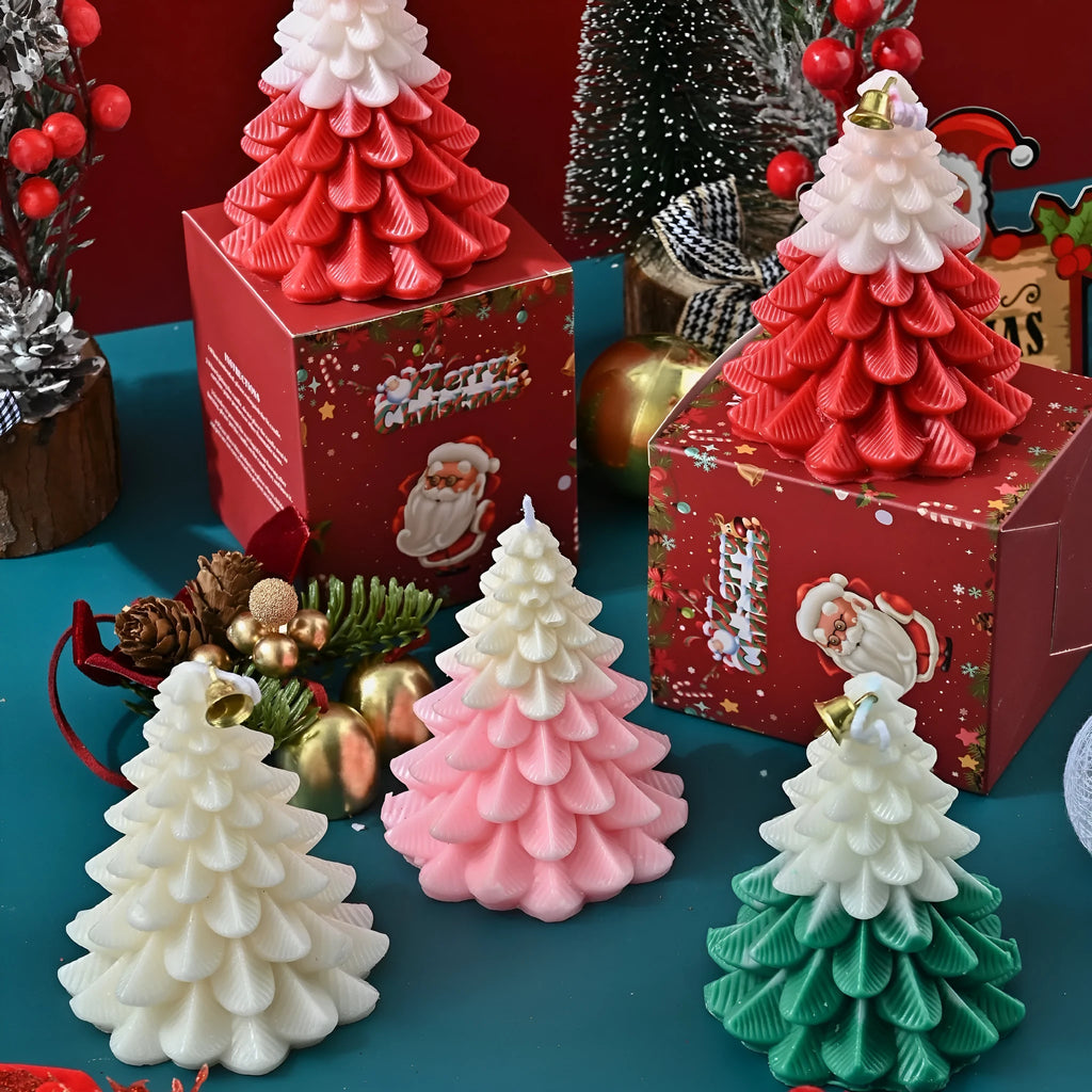 Christmas tree shaped soy wax aromatherapy candle in green on a table with festive home decoration