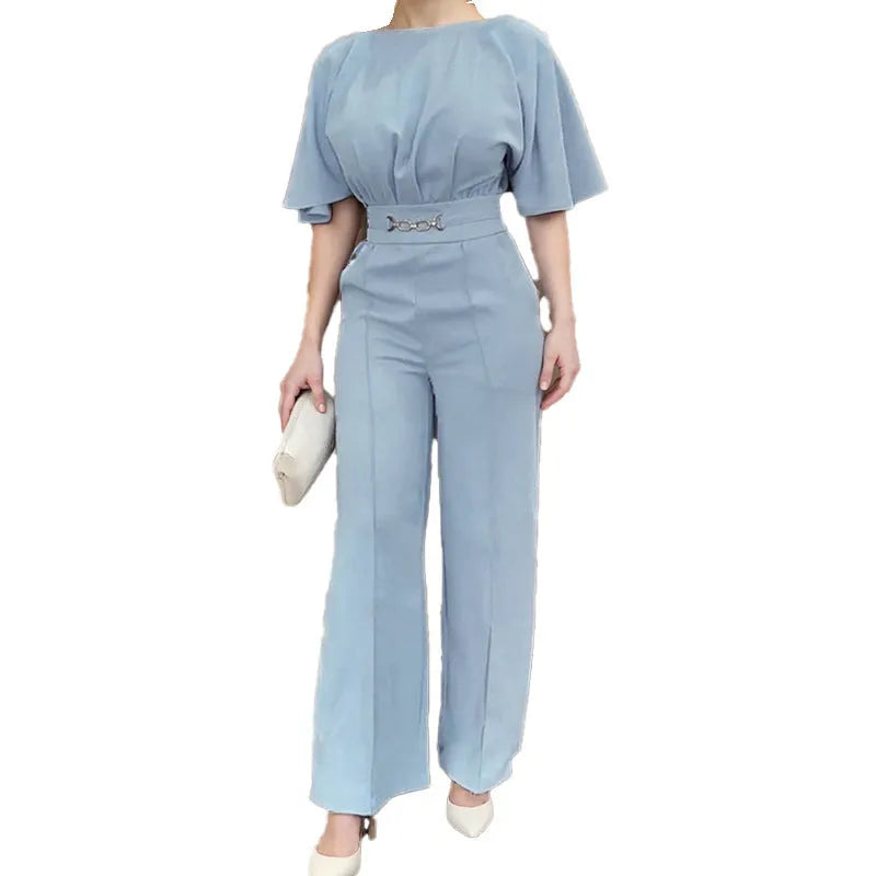 Men's blue slim-fit polyester suit with trousers and long sleeves on a hanger
