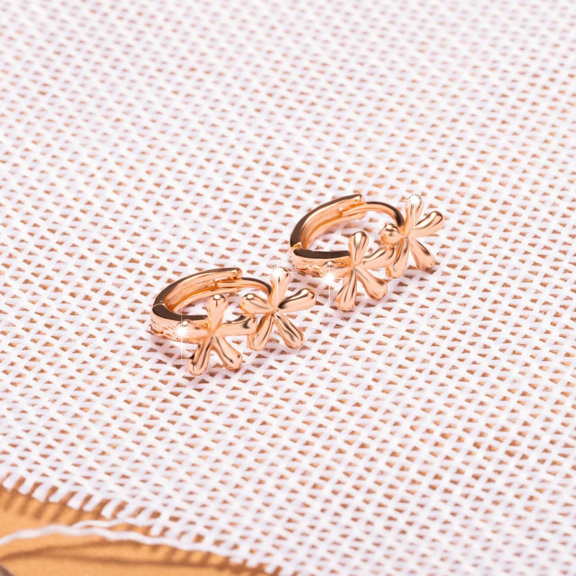 Rose gold circular earrings with waterdrop flower design using electroplating for women