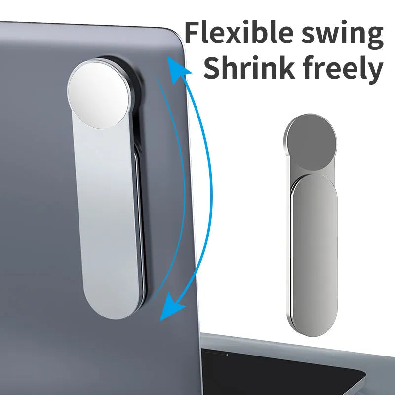 Silver aluminium alloy mobile phone bracket with magnetic attachment mounted next to computer screen