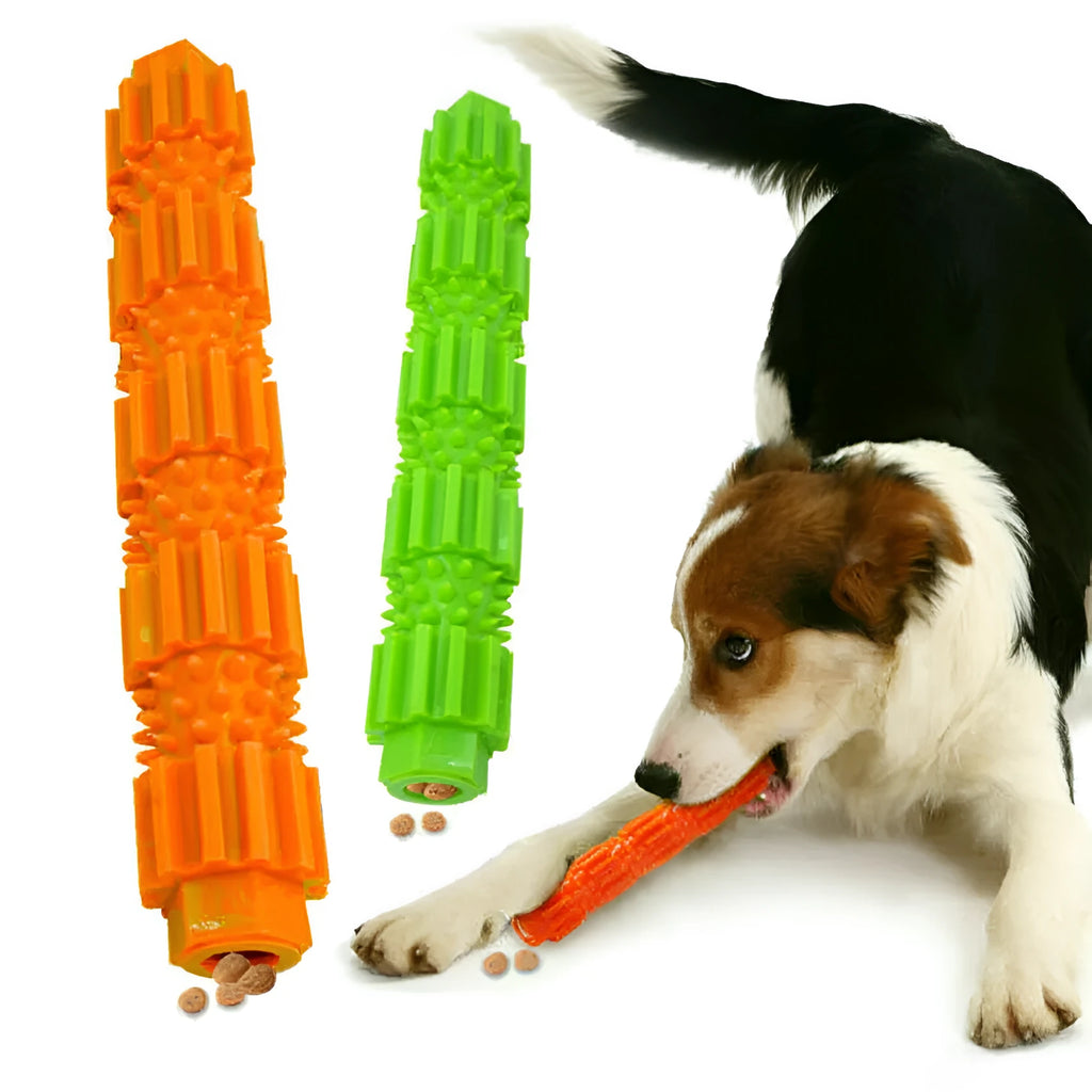Green and orange durable rubber dog chew toy with treat dispenser hole for aggressive chewers.