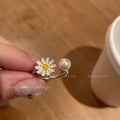 Women's copper opening ring with electroplated finish in daisy pearl and plain styles