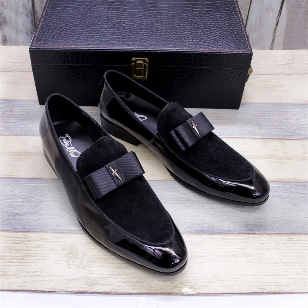 Men's low-top patent leather shoes in black with a tassel detail and rubber sole.