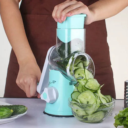 Manual round mandoline vegetable slicer with stainless steel blades in blue colour