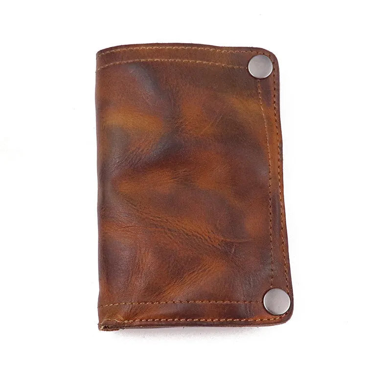 Men's retro style vertical long wallet in genuine cowhide leather showing multiple internal card slots and compartments.