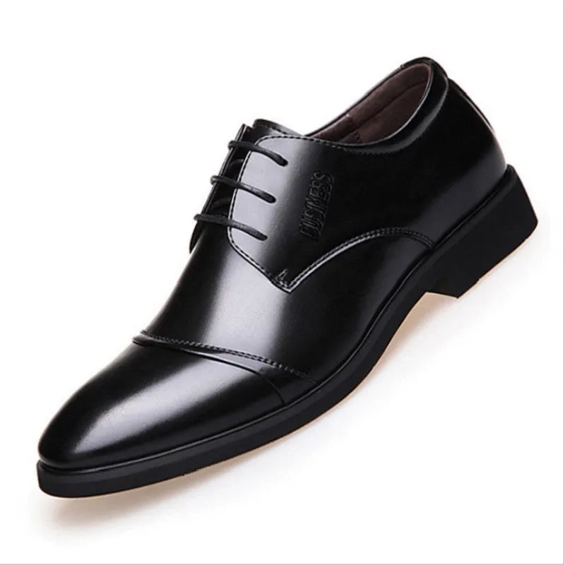 Men's black formal lace-up shoe with decorative stitching and a horse buckle on a rubber sole.