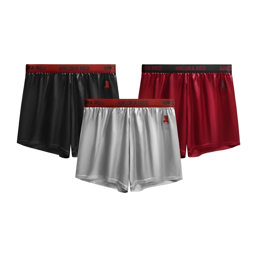 Men's solid colour boxer briefs in polyester knit fabric showing mid waist design