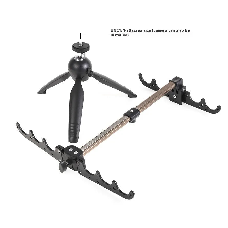 Aluminium tripod ice fishing rod holder bracket on ice.
