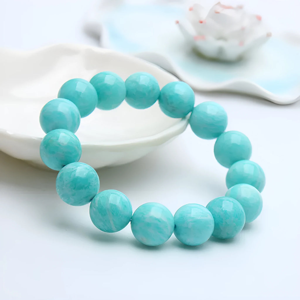Amazonite gemstone bracelet with polished blue-green beads, shown in 8mm, 9mm, and 10mm size options.