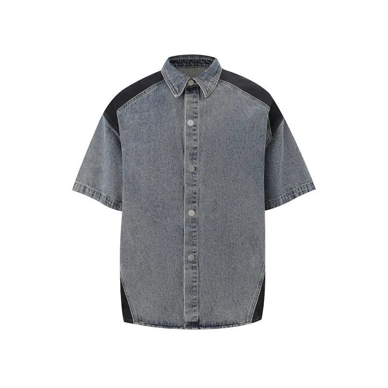 Retro washed blue denim short-sleeve jacket and matching trousers suit set on a hanger