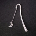 Retro five-pointed star metal bookmark with glowing elements in ancient silver finish