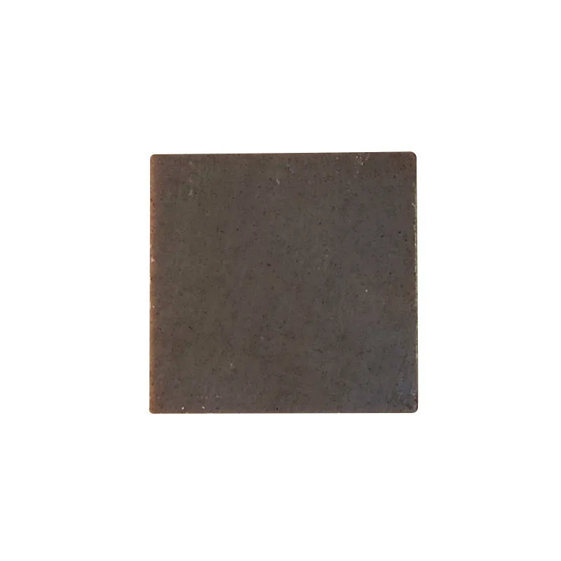 A single 72g bar of nine grass cold process shampoo soap on a plain background.